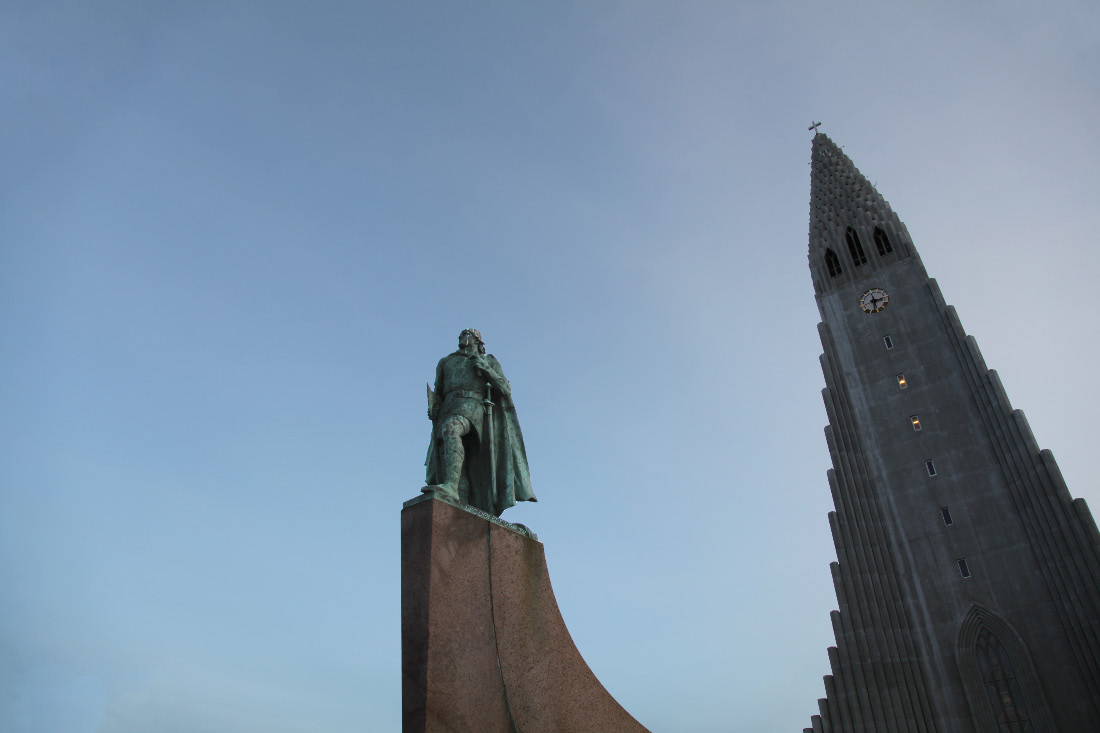 Hallgrímskirkja and Leifr Eiríksson sculpture by A.S. Calder with Cross and sword and battleaxe —  the Old Evangelization